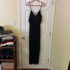 Sage black jumpsuit with ruffle detail